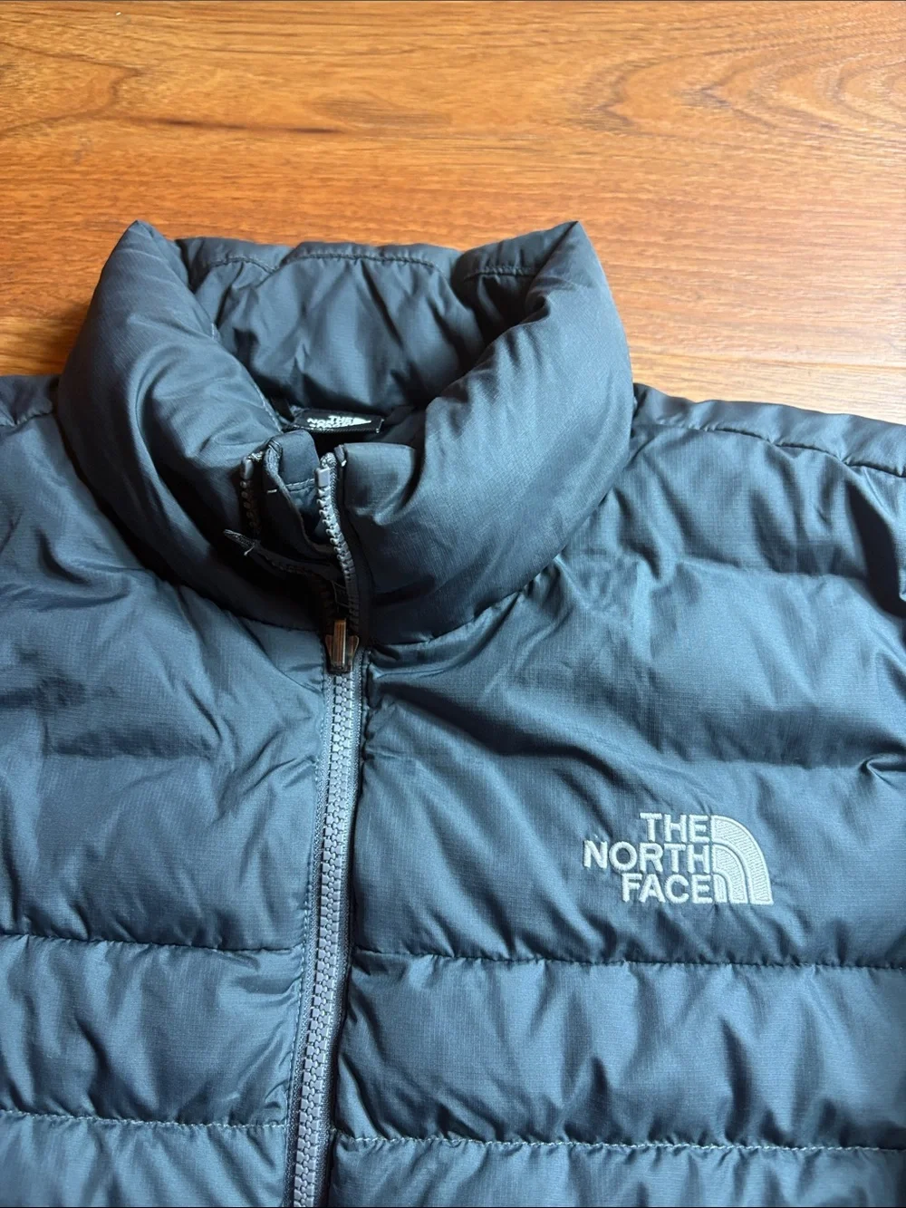 The North Face 550 men’s medium gray Quilted Puffer Jacket